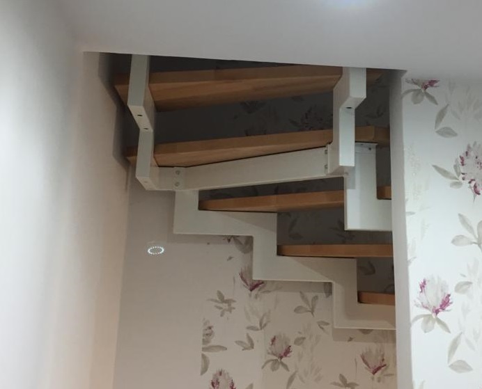 Neuerschließung des Spitzbodens durch einen Deckendurchbruch in einem Wohnhaus in Telgte (NRW)